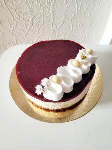 Cheesecake spéculoos et coulis framboise